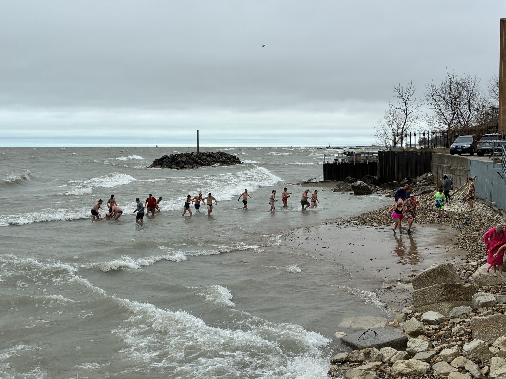 The plunge — everyone in the waves at Fargo Beach